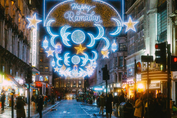 A vibrant street in Dubai decorated with festive lights for Ramadan, highlighting the lively atmosphere.