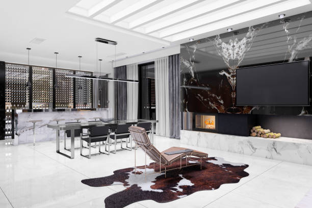 Modern living room with sleek decor, open kitchen, and marble accents, illustrating high-end investment property.